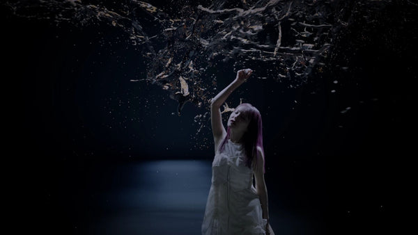 Water dancing around over LiSA's head in the Zankoku no Yoru ni Kagayake music video.